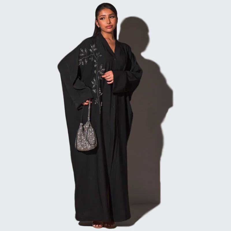 Abaya noire à strass et perles en forme de feuilles